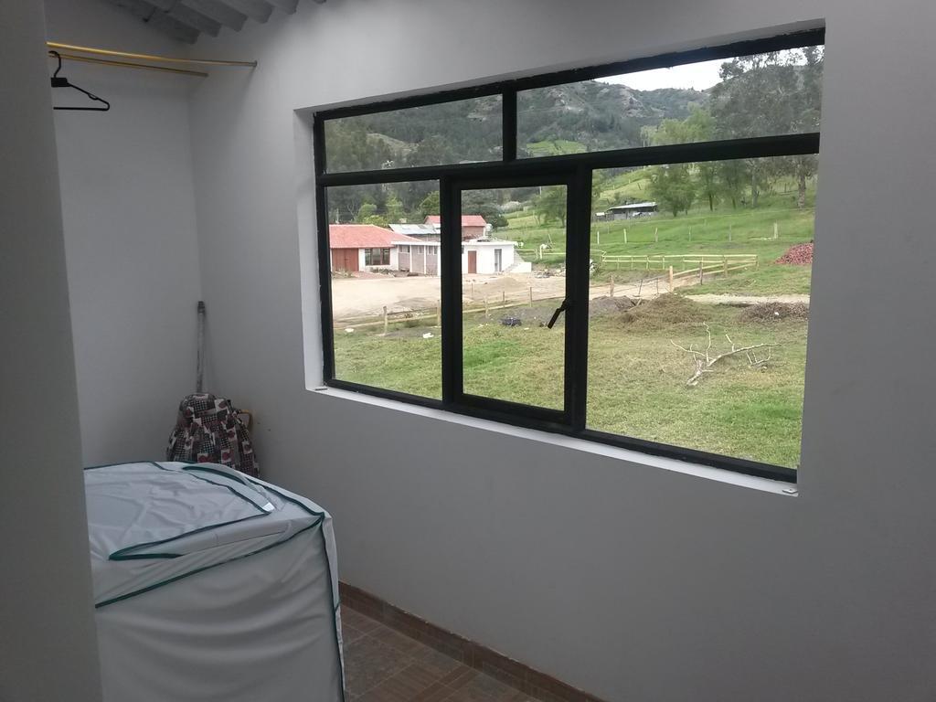 Hospedaje El Mirador Iza Esterno foto