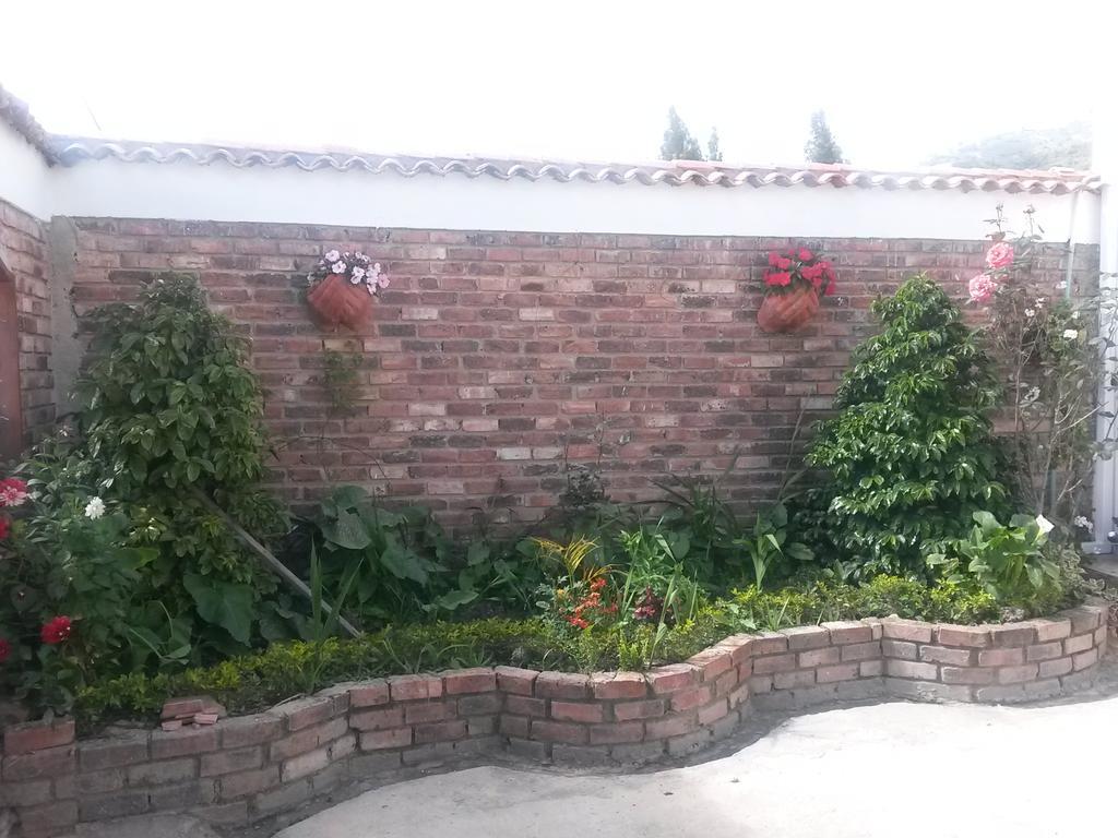 Hospedaje El Mirador Iza Esterno foto